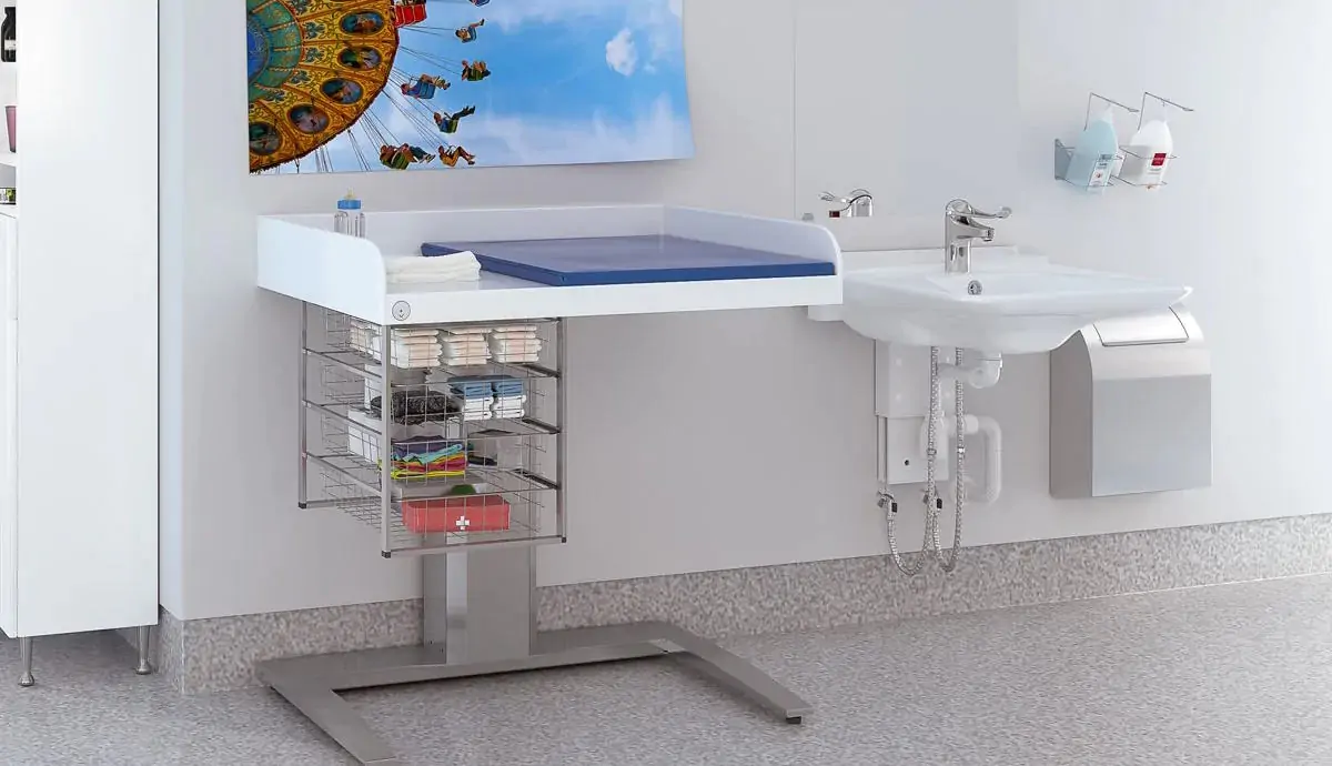 Granberg 343 electrically height adjustable Corian nursing table