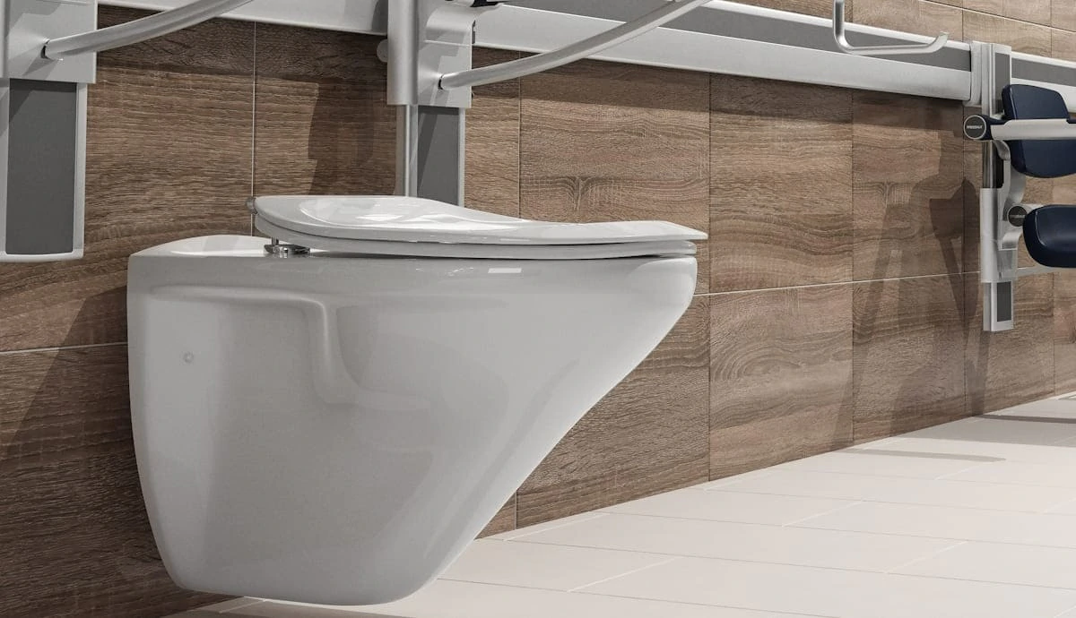 Pressalit wall hung rimless WC pan in an accessible toilet
