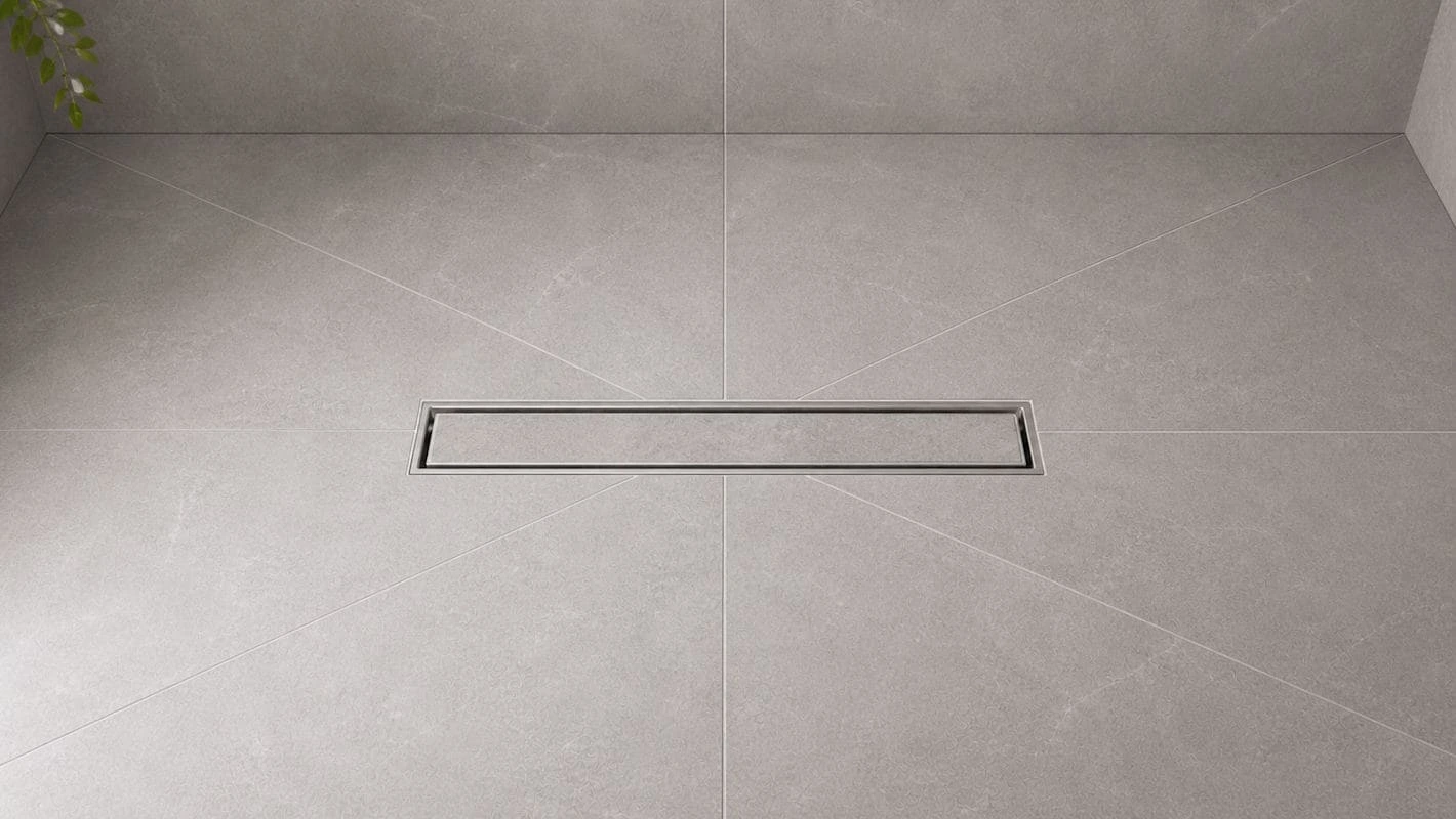 Accessible wet room with contemporary floor drainage and level access shower