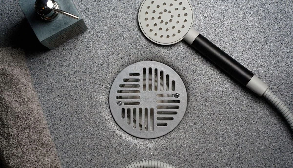 Round wetroom drain grid for sheet vinyl flooring