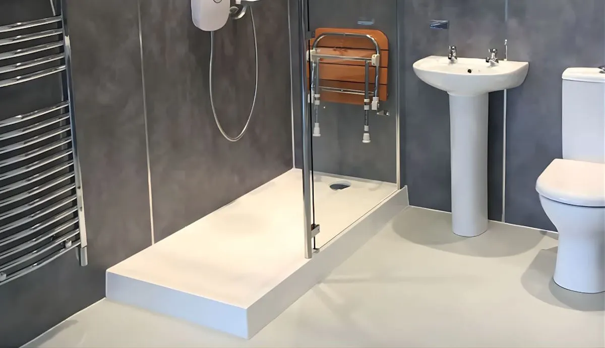 Raised AKW Sulby step-in shower tray with built-in above-floor waste