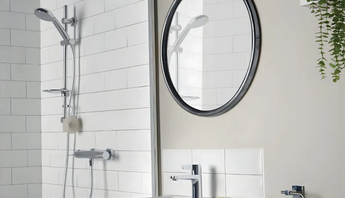 Accessible shower handset on adjustable grab rail with long hose