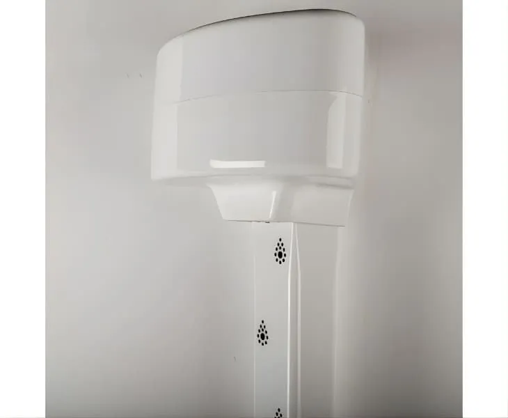 Wall mounted warm air body dryer installed within an accessible shower room