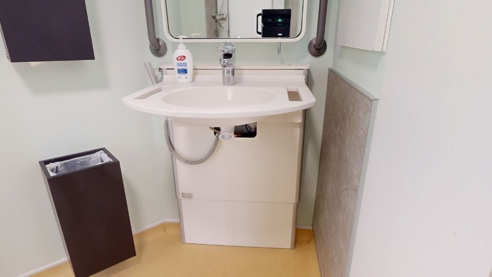 Granberg Basicline 415 electric basin lift in the Bathroom Area
