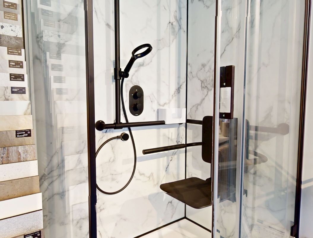 HEWI shower grab rail with magnetic shower-head holder