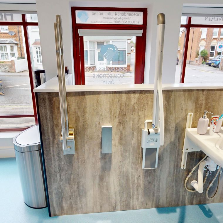 HEWI and Pressalit folding support arms in the Independent 4 Life bathroom showroom