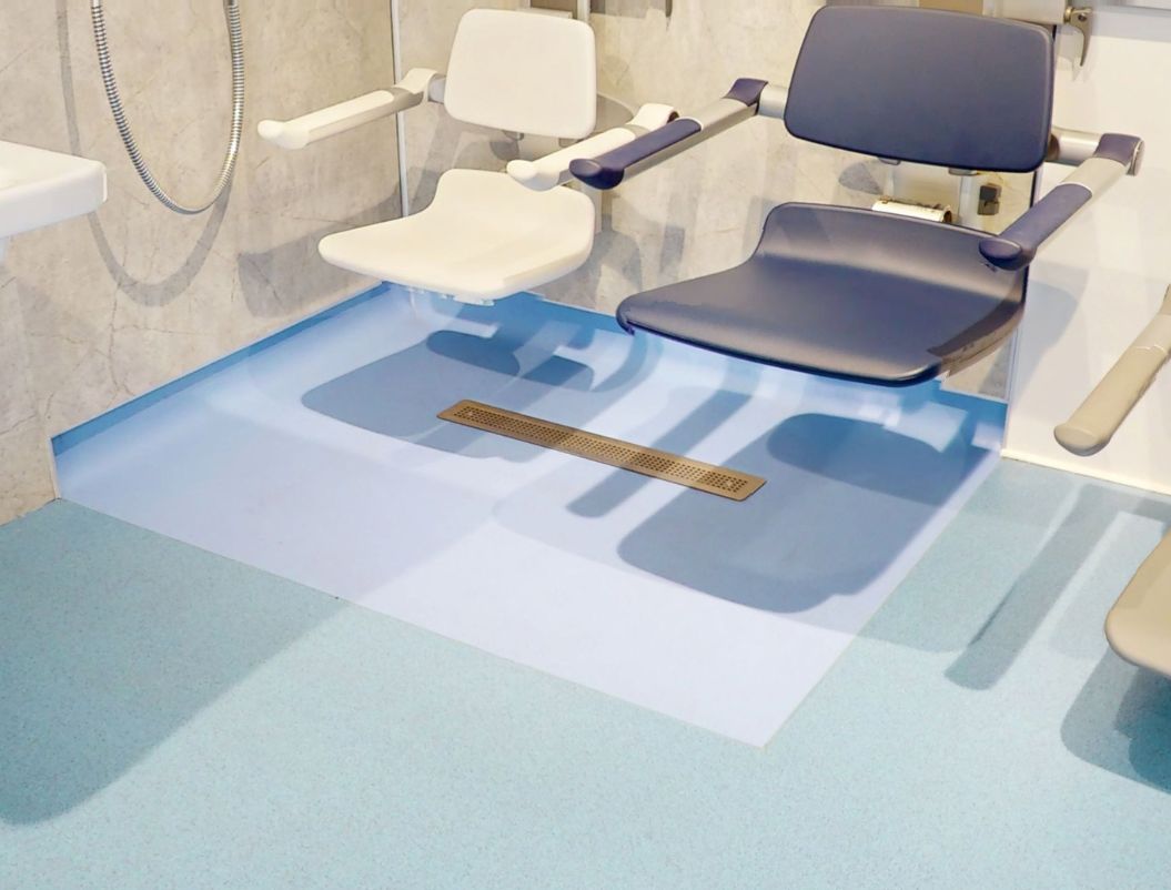 Maxxus linear wet-room former and Purus drain