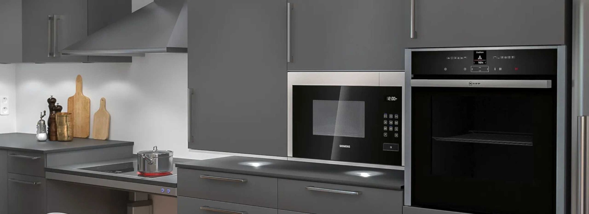 A diagonal electric height-adjustable wall cabinet installed in a modern kitchen