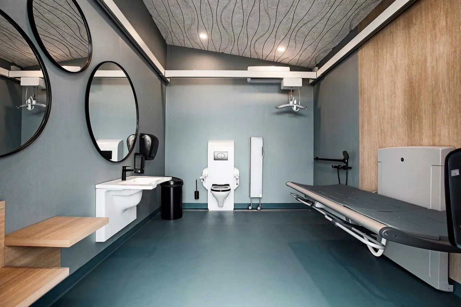 Modern accessible bathroom using Pressalit equipment