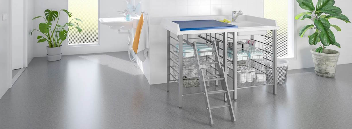 Granberg Fixed Height Changing Tables 327 and Laundry Sink 328