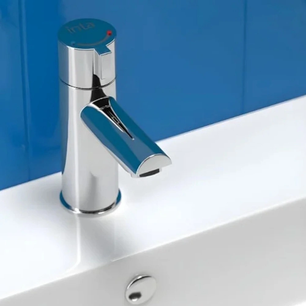 Inta non-concussive timed-flow washbasin tap
