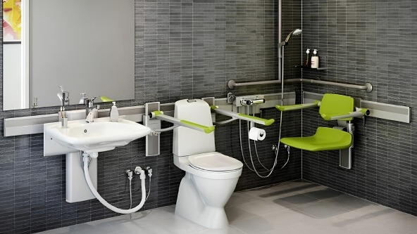 Pressalit PLUS adaptable bathroom with washbasin and support equipment mounted on horizontal wall tracks