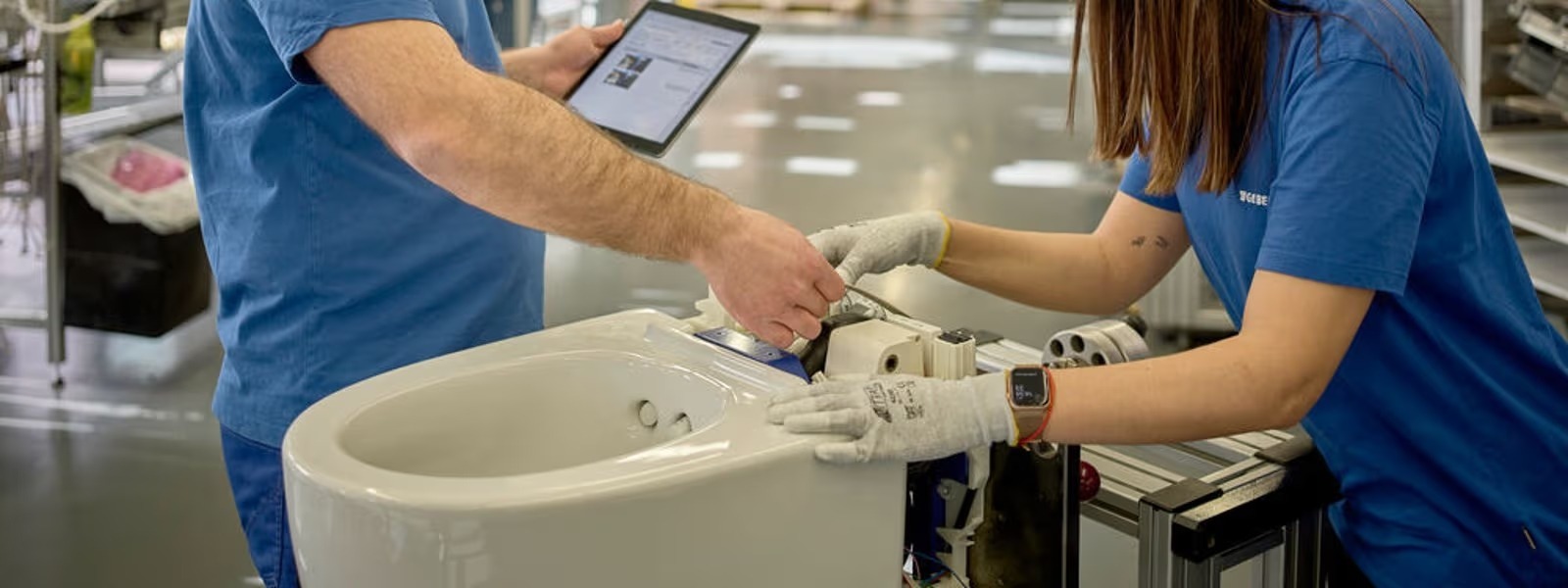 Specialist accessible toilet system being reviewed in a modern bathroom