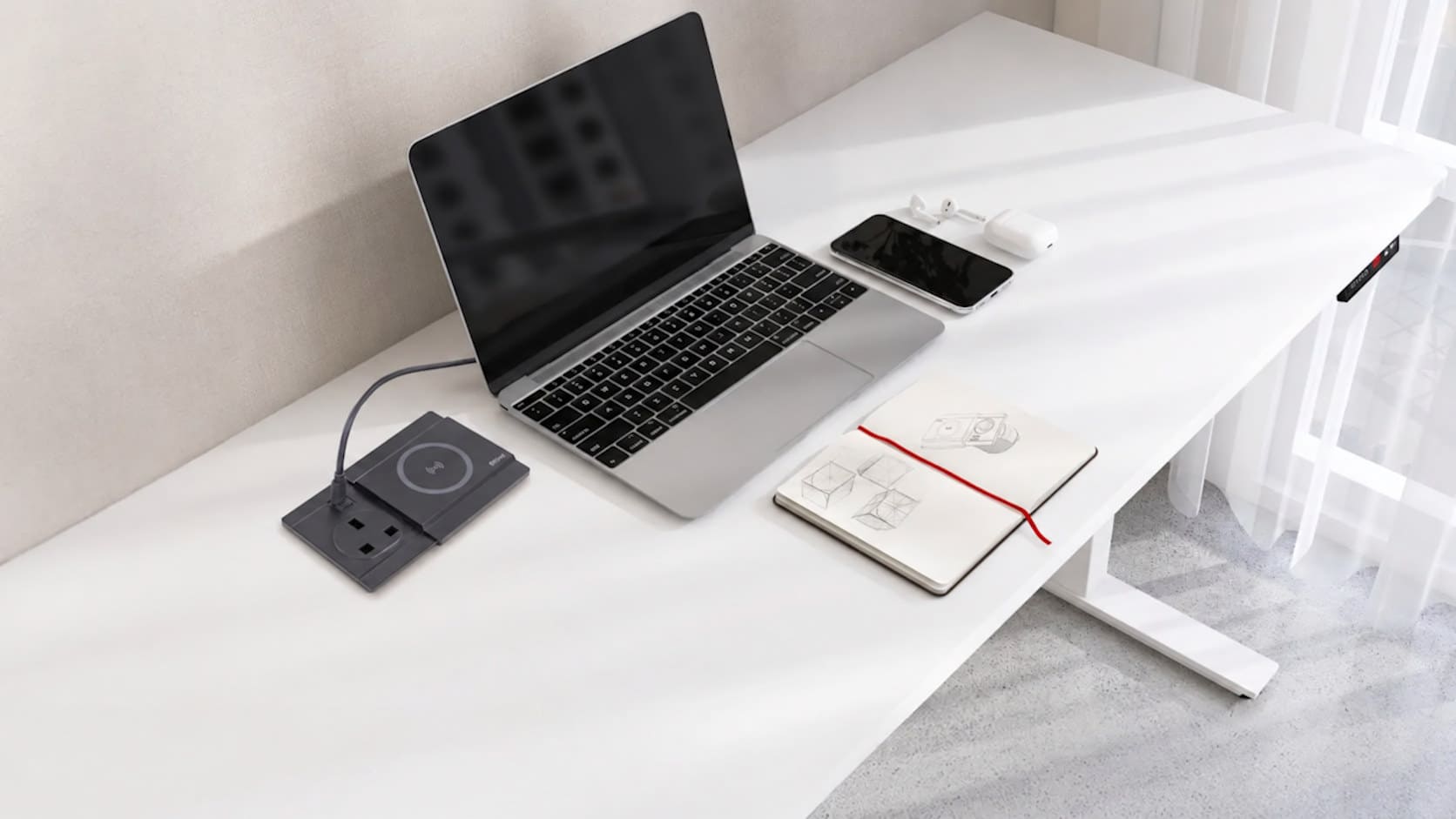 EVOline concealed socket and wireless charging system integrated into a kitchen worktop