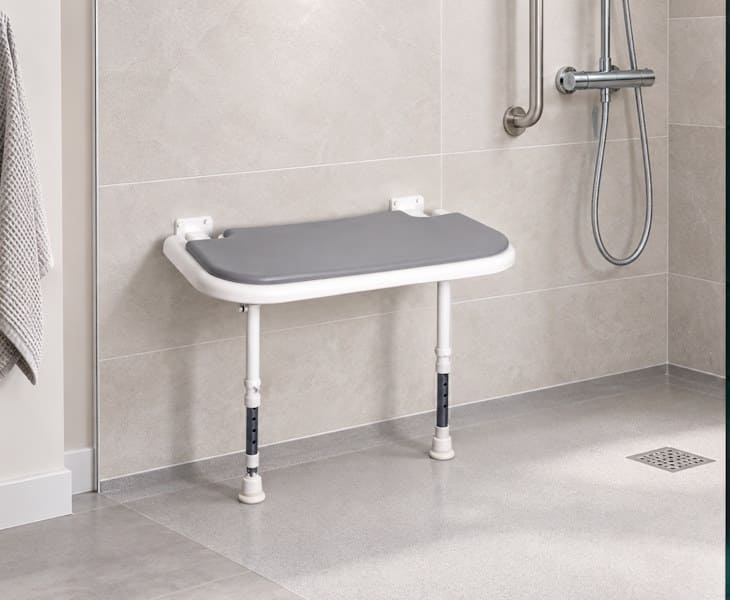 Extra-wide bariatric folding shower seat with support legs