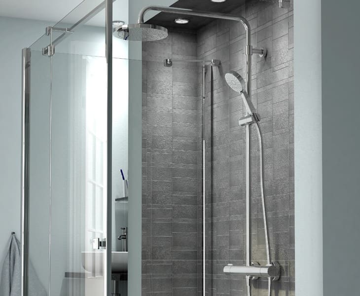 Dual shower system with overhead shower and separate handheld shower for flexible bathroom use