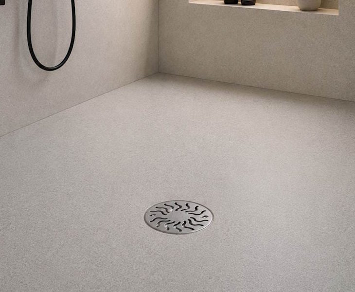 Vinyl wet room floor former with integrated falls and drain outlet