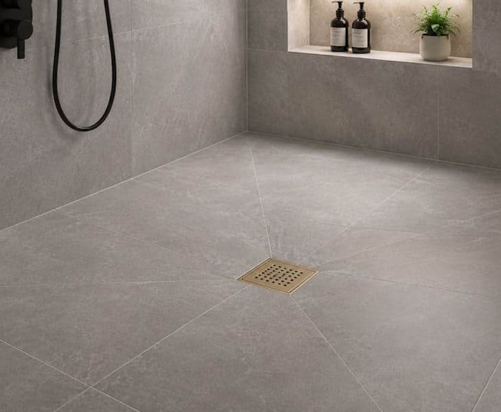 Tiled wet room floor former with integrated falls and drain outlet