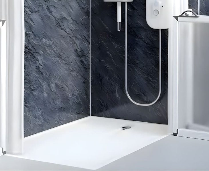 Level access shower tray installed flush with the bathroom floor