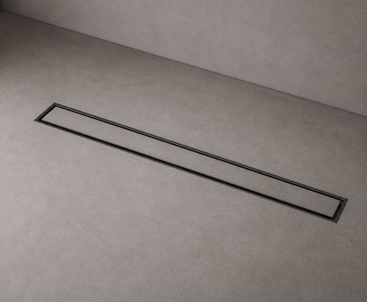 Linear drain with microcement infill for a seamless wetroom floor