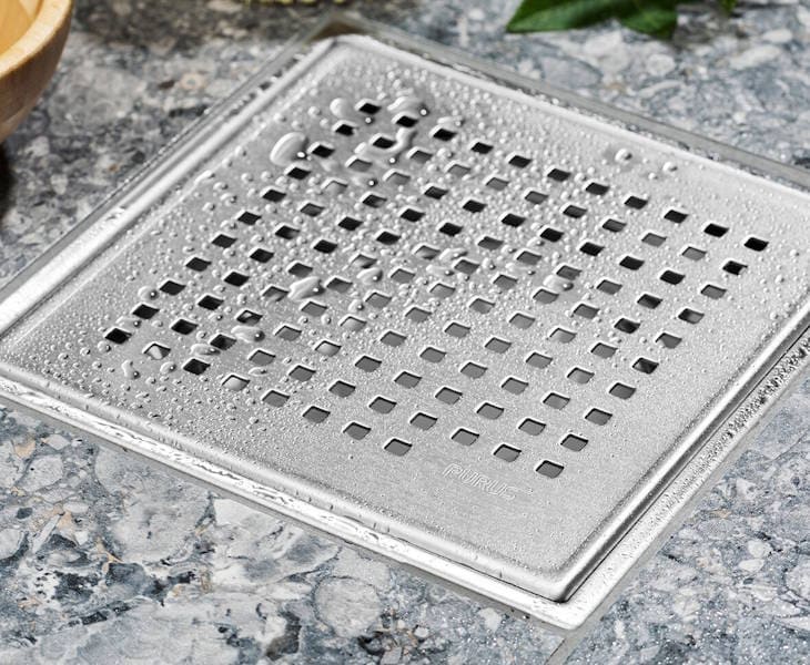 Selection of tiled flooring grids for wetroom drains