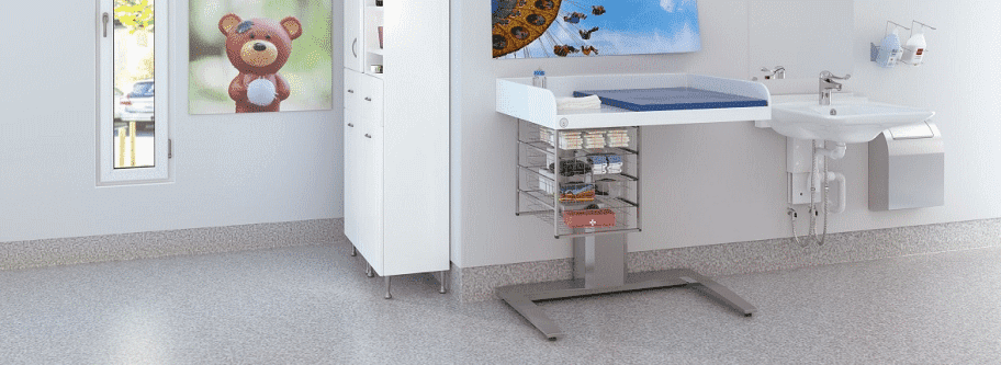 Installed example of the Granberg Nursing Table 343 - Height Adjustable with Bathtub