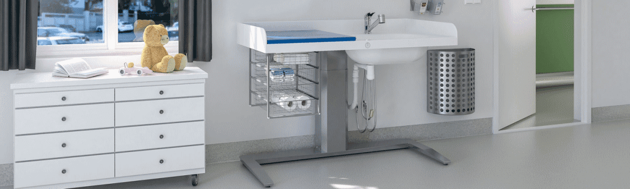 Installed example of the Granberg Nursing Table 343 - Height Adjustable with Bathtub